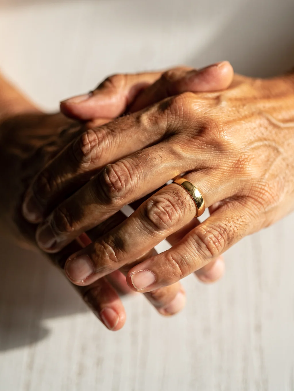 Compassionate hands holding each other in support